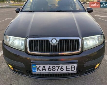 Черный Шкода Фабия, объемом двигателя 1.39 л и пробегом 240 тыс. км за 5000 $, фото 5 на Automoto.ua