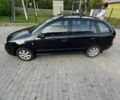 Черный Шкода Фабия, объемом двигателя 1.4 л и пробегом 230 тыс. км за 4400 $, фото 1 на Automoto.ua