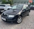 Черный Шкода Фабия, объемом двигателя 1.39 л и пробегом 164 тыс. км за 4950 $, фото 1 на Automoto.ua