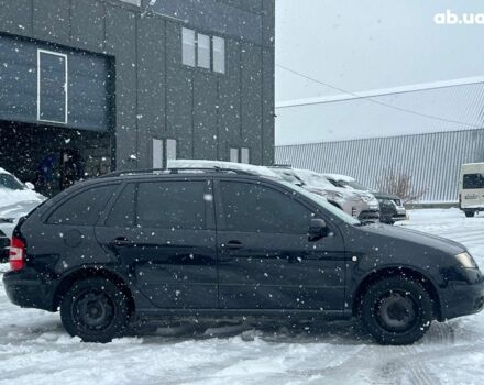 Черный Шкода Фабия, объемом двигателя 1.4 л и пробегом 276 тыс. км за 5440 $, фото 9 на Automoto.ua