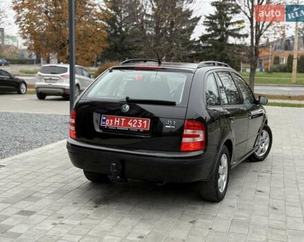 Черный Шкода Фабия, объемом двигателя 1.39 л и пробегом 249 тыс. км за 4550 $, фото 3 на Automoto.ua