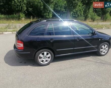 Черный Шкода Фабия, объемом двигателя 1.4 л и пробегом 235 тыс. км за 4700 $, фото 8 на Automoto.ua