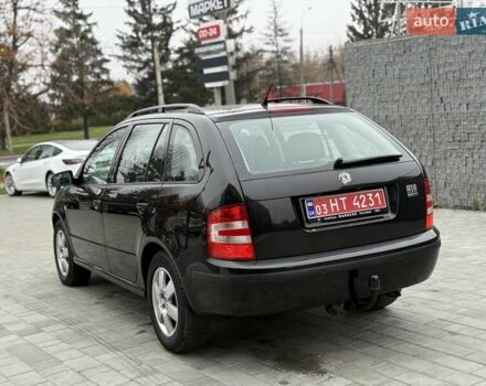 Черный Шкода Фабия, объемом двигателя 1.39 л и пробегом 249 тыс. км за 4550 $, фото 16 на Automoto.ua