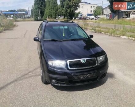 Черный Шкода Фабия, объемом двигателя 1.4 л и пробегом 235 тыс. км за 4700 $, фото 1 на Automoto.ua