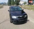 Черный Шкода Фабия, объемом двигателя 1.4 л и пробегом 235 тыс. км за 4700 $, фото 1 на Automoto.ua
