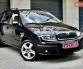 Черный Шкода Фабия, объемом двигателя 1.4 л и пробегом 170 тыс. км за 5050 $, фото 4 на Automoto.ua