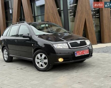 Черный Шкода Фабия, объемом двигателя 1.39 л и пробегом 249 тыс. км за 4550 $, фото 8 на Automoto.ua