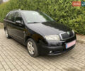Черный Шкода Фабия, объемом двигателя 1.4 л и пробегом 246 тыс. км за 4399 $, фото 1 на Automoto.ua
