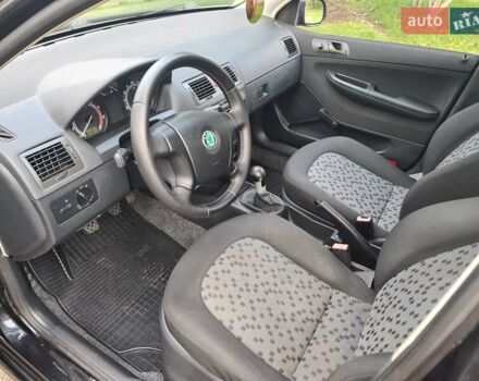 Черный Шкода Фабия, объемом двигателя 1.4 л и пробегом 196 тыс. км за 4699 $, фото 8 на Automoto.ua