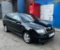 Черный Шкода Фабия, объемом двигателя 2 л и пробегом 201 тыс. км за 5200 $, фото 1 на Automoto.ua
