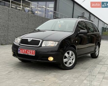 Черный Шкода Фабия, объемом двигателя 1.39 л и пробегом 249 тыс. км за 4550 $, фото 1 на Automoto.ua