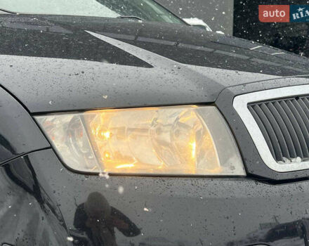 Черный Шкода Фабия, объемом двигателя 1.4 л и пробегом 276 тыс. км за 5440 $, фото 12 на Automoto.ua