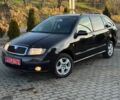 Чорний Шкода Фабія, об'ємом двигуна 1.4 л та пробігом 206 тис. км за 4399 $, фото 3 на Automoto.ua