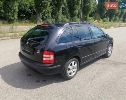 Черный Шкода Фабия, объемом двигателя 1.4 л и пробегом 235 тыс. км за 4700 $, фото 12 на Automoto.ua