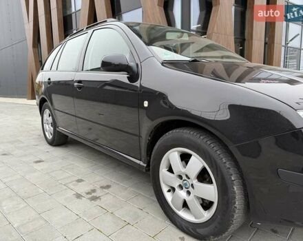 Черный Шкода Фабия, объемом двигателя 1.39 л и пробегом 249 тыс. км за 4550 $, фото 23 на Automoto.ua