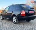 Чорний Шкода Фабія, об'ємом двигуна 1.39 л та пробігом 205 тис. км за 4450 $, фото 6 на Automoto.ua