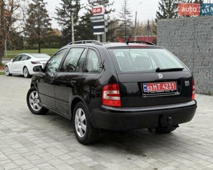 Черный Шкода Фабия, объемом двигателя 1.39 л и пробегом 249 тыс. км за 4550 $, фото 11 на Automoto.ua