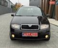 Черный Шкода Фабия, объемом двигателя 1.39 л и пробегом 249 тыс. км за 4550 $, фото 14 на Automoto.ua