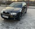 Черный Шкода Фабия, объемом двигателя 1.4 л и пробегом 168 тыс. км за 2100 $, фото 1 на Automoto.ua