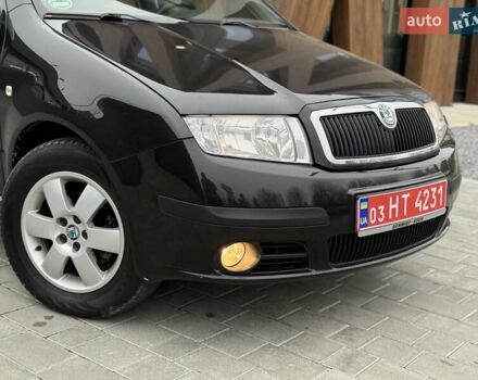 Черный Шкода Фабия, объемом двигателя 1.39 л и пробегом 249 тыс. км за 4550 $, фото 6 на Automoto.ua