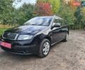 Черный Шкода Фабия, объемом двигателя 1.4 л и пробегом 196 тыс. км за 4699 $, фото 3 на Automoto.ua