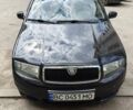 Черный Шкода Фабия, объемом двигателя 1.39 л и пробегом 304 тыс. км за 4100 $, фото 1 на Automoto.ua