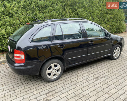 Черный Шкода Фабия, объемом двигателя 1.4 л и пробегом 246 тыс. км за 4399 $, фото 5 на Automoto.ua