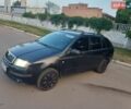 Черный Шкода Фабия, объемом двигателя 1.2 л и пробегом 185 тыс. км за 3900 $, фото 1 на Automoto.ua