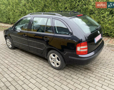 Черный Шкода Фабия, объемом двигателя 1.4 л и пробегом 246 тыс. км за 4399 $, фото 13 на Automoto.ua