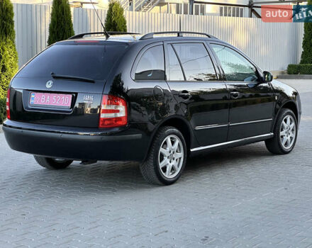 Черный Шкода Фабия, объемом двигателя 1.4 л и пробегом 230 тыс. км за 5200 $, фото 4 на Automoto.ua