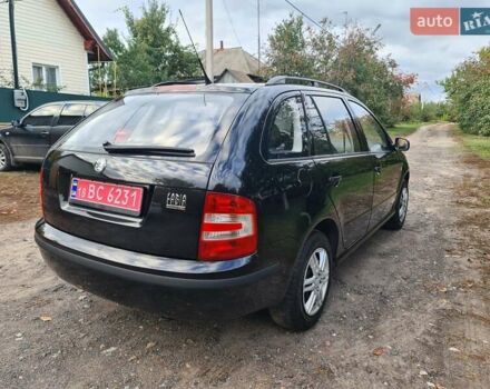 Черный Шкода Фабия, объемом двигателя 1.4 л и пробегом 196 тыс. км за 4699 $, фото 2 на Automoto.ua