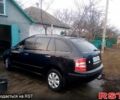 Черный Шкода Фабия, объемом двигателя 1.4 л и пробегом 250 тыс. км за 4350 $, фото 1 на Automoto.ua