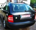 Черный Шкода Фабия, объемом двигателя 1.4 л и пробегом 219 тыс. км за 4699 $, фото 1 на Automoto.ua