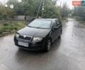 Черный Шкода Фабия, объемом двигателя 1.2 л и пробегом 299 тыс. км за 2610 $, фото 1 на Automoto.ua
