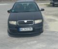 Черный Шкода Фабия, объемом двигателя 1.39 л и пробегом 230 тыс. км за 4400 $, фото 1 на Automoto.ua