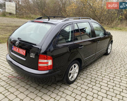 Черный Шкода Фабия, объемом двигателя 1.4 л и пробегом 171 тыс. км за 5350 $, фото 8 на Automoto.ua