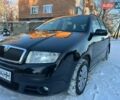 Черный Шкода Фабия, объемом двигателя 1.39 л и пробегом 200 тыс. км за 4500 $, фото 1 на Automoto.ua