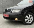 Черный Шкода Фабия, объемом двигателя 1.39 л и пробегом 249 тыс. км за 4550 $, фото 2 на Automoto.ua