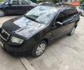 Черный Шкода Фабия, объемом двигателя 1.39 л и пробегом 304 тыс. км за 4100 $, фото 1 на Automoto.ua