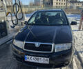 Черный Шкода Фабия, объемом двигателя 1.4 л и пробегом 212 тыс. км за 4500 $, фото 1 на Automoto.ua