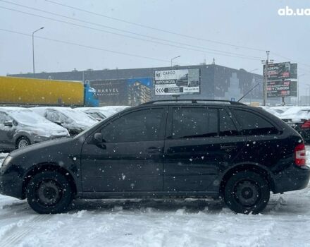 Черный Шкода Фабия, объемом двигателя 1.4 л и пробегом 276 тыс. км за 5440 $, фото 3 на Automoto.ua