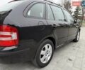 Черный Шкода Фабия, объемом двигателя 1.39 л и пробегом 249 тыс. км за 4550 $, фото 18 на Automoto.ua