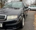 Черный Шкода Фабия, объемом двигателя 1.4 л и пробегом 179 тыс. км за 4700 $, фото 2 на Automoto.ua