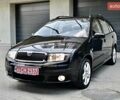 Черный Шкода Фабия, объемом двигателя 1.4 л и пробегом 170 тыс. км за 5050 $, фото 24 на Automoto.ua