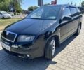 Черный Шкода Фабия, объемом двигателя 1.2 л и пробегом 232 тыс. км за 3700 $, фото 1 на Automoto.ua
