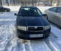 Черный Шкода Фабия, объемом двигателя 1.4 л и пробегом 201 тыс. км за 4200 $, фото 1 на Automoto.ua
