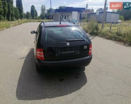 Черный Шкода Фабия, объемом двигателя 1.4 л и пробегом 235 тыс. км за 4700 $, фото 14 на Automoto.ua