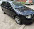 Черный Шкода Фабия, объемом двигателя 1.39 л и пробегом 304 тыс. км за 4100 $, фото 2 на Automoto.ua