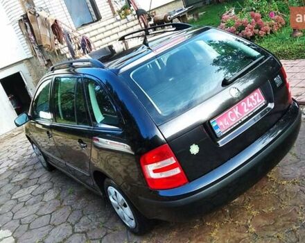 Шкода Фабия 2006 в Чернигове на Automoto.ua Черный Шкода Фабия, объемом двигателя 1.4 л и пробегом 219 тыс. км за 4699 $, фото 10 на Automoto.ua