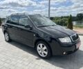 Черный Шкода Фабия, объемом двигателя 2 л и пробегом 201 тыс. км за 5200 $, фото 1 на Automoto.ua